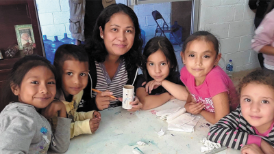 Rosalia working with children